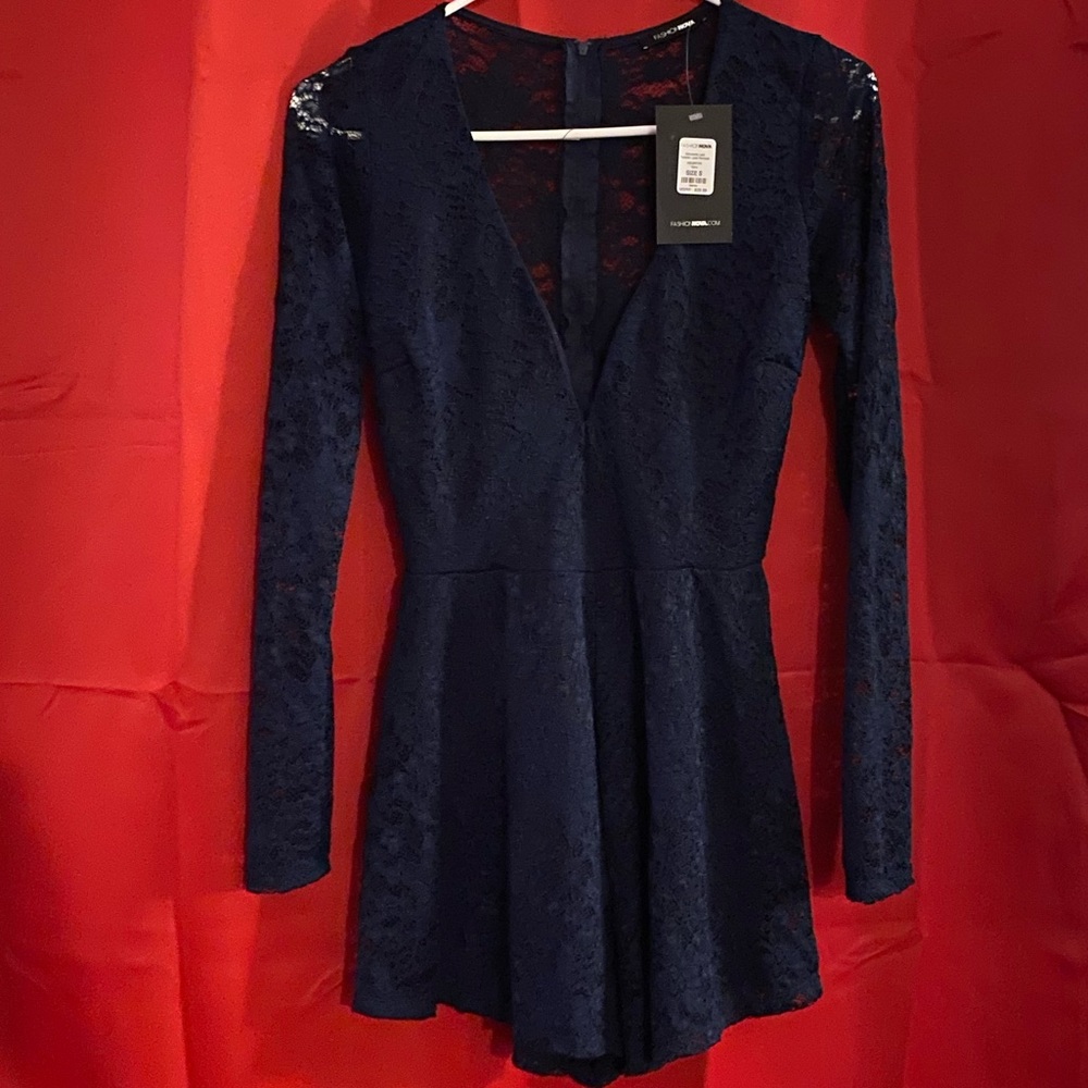Laced navy blue long sleeve romper